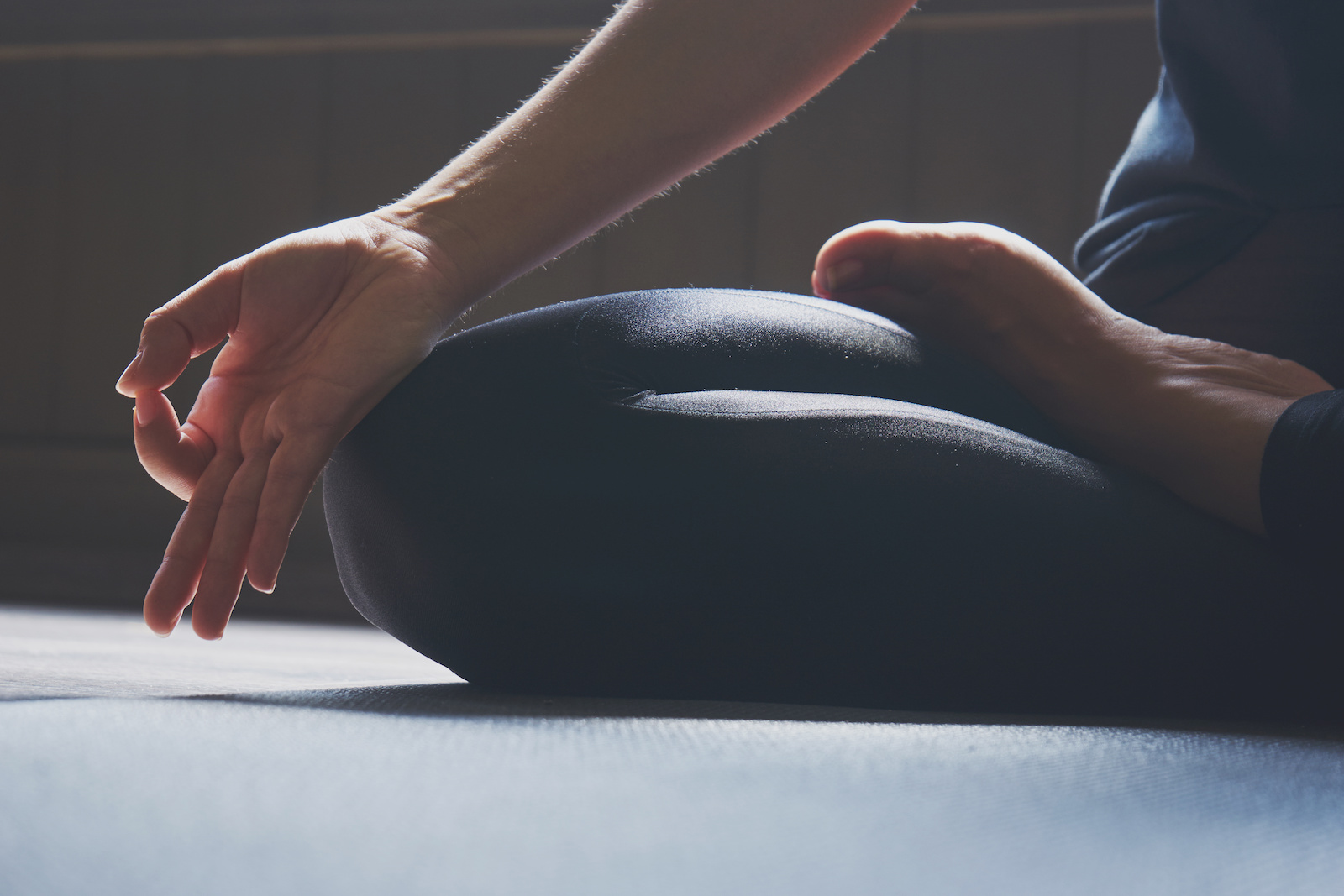 Woman practicing yoga in various poses (asana)